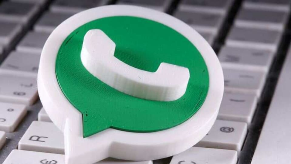 FILE PHOTO:  A 3D printed Whatsapp logo is placed on the keyboard in this illustration taken April 12, 2020. REUTERS/Dado Ruvic/Illustration/File photo