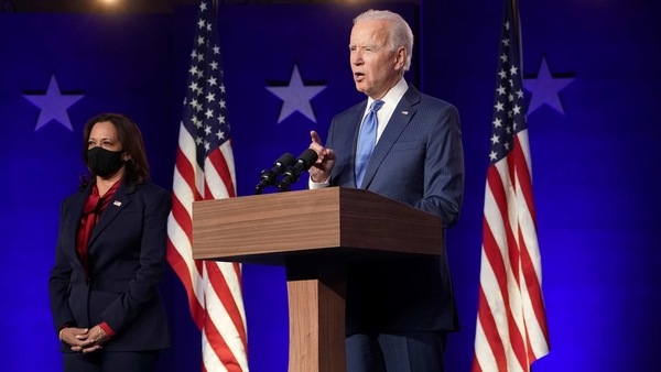 US Democratic presidential nominee Joe Biden speaks about election results next to vice presidential nominee Kamala Harris in Wilmington, Delaware. 