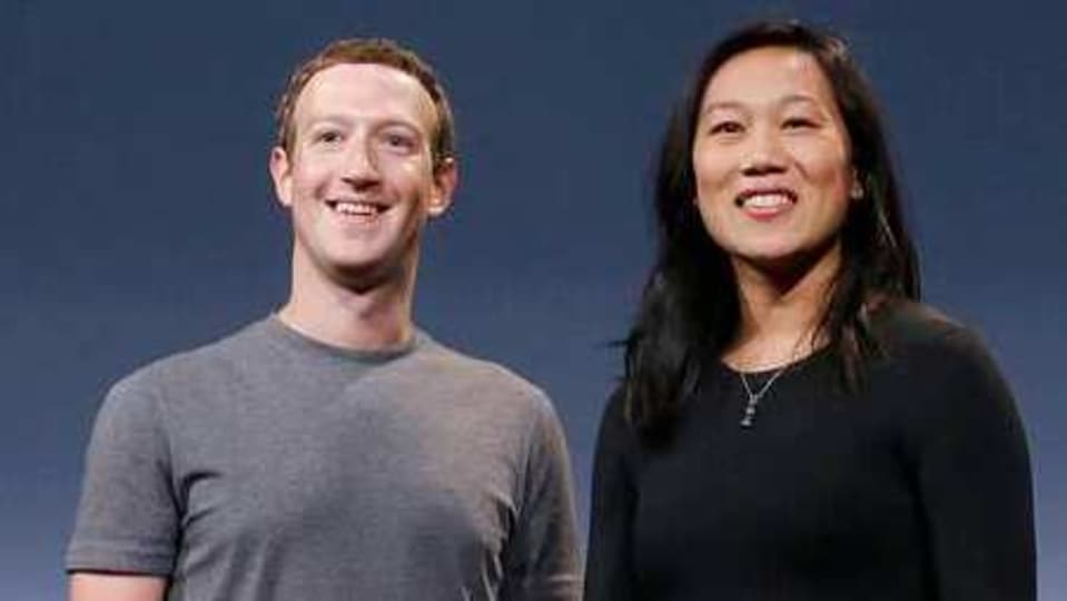 Facebook CEO Mark Zuckerberg and his wife, Priscilla Chan.