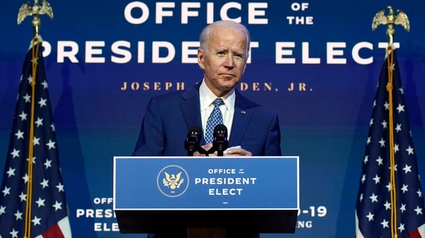 FILE - In this Nov. 9, 2020, file photo President-elect Joe Biden speaks The Queen theater in Wilmington, Del. Biden says he wants to “restore the soul of America.” But first the president-elect will need to fix a broken Congress. (AP Photo/Carolyn Kaster, File)
