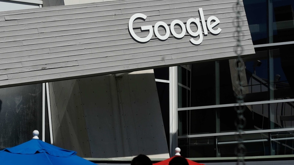 Mountain View:FILE - In this Sept. 24, 2019, file photo people walk by a Google sign on the campus in Mountain View, Calif. USA., The  coalition of technology and publishing companies, Marketers for an Open Web said Monday Nov. 23, 2020, they have asked  U.K. competition watchdog  to investigate Google's plans to revamp its ad data system, saying the changes would cement the U.S. tech giant's online dominance. AP/PTI Photo(AP23-11-2020_000188B)