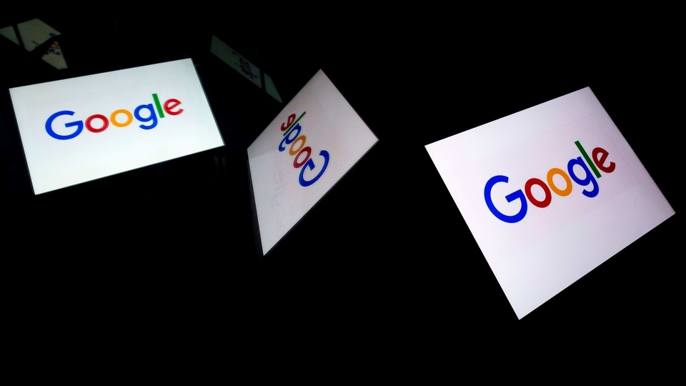 (FILES) In this file photo taken on February 16, 2019 this illustration picture shows the US  multinational technology and Internet-related services company Google logo displayed on a tablet in Paris. - A powerhouse line-up of earnings releases on October 29, is expected to show that giants of Big Tech are on firm financial footing despite turbulent politics and the coronavirus pandemic. Amazon, Apple, Facebook, Twitter and Google-parent Alphabet are all slated to disclose how their businesses faired in the third quarter of this year. (Photo by Lionel BONAVENTURE / AFP)