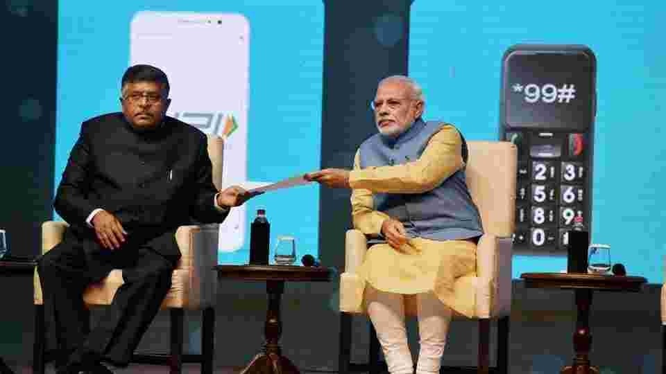 PM Narendra Modi and Union minister Ravi Shanker Prasad at the launch of mobile app 'Bhim' at Talkatora Stadium in New Delhi.