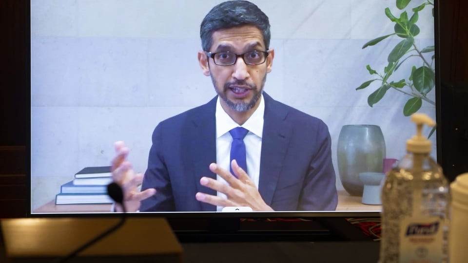 Sundar Pichai, chief executive officer of Alphabet Inc., speaks via videoconference during a Senate Commerce, Science and Transportation Committee hearing in Washington, D.C., U.S., on Wednesday, Oct. 28, 2020. The heads of America's big internet companies will defend legal protections granted to the industry today when they testify before a congressional committee about social media's role in moderating speech online. Photographer: Michael Reynolds/EPA/Bloomberg