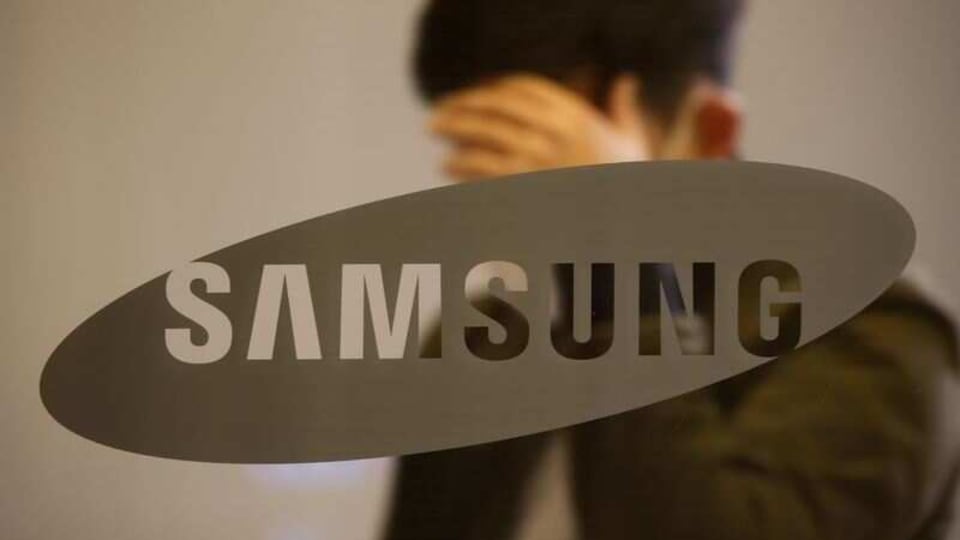 A man walks past the logo of Samsung at its office building in Seoul, South Korea, October 25, 2020.    REUTERS/Kim Hong-Ji