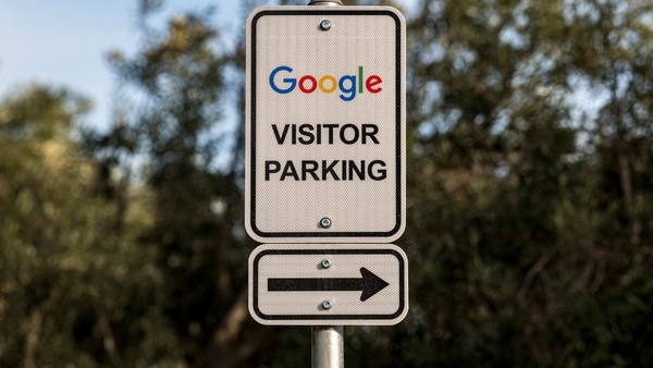 Directional signage in front of a building on the Google campus in Mountain View, California, U.S., on Wednesday, Dec. 16, 2020. On Wednesday, Texas Attorney General�Ken Paxton�filed an�antitrust lawsuit�against�Alphabet Inc.'s Google. At its center is a bold claim: Google colluded with archrival�Facebook Inc.�in an illegal deal to manipulate auctions for online advertising, an industry the two companies dominate. Photographer: David Paul Morris/Bloomberg