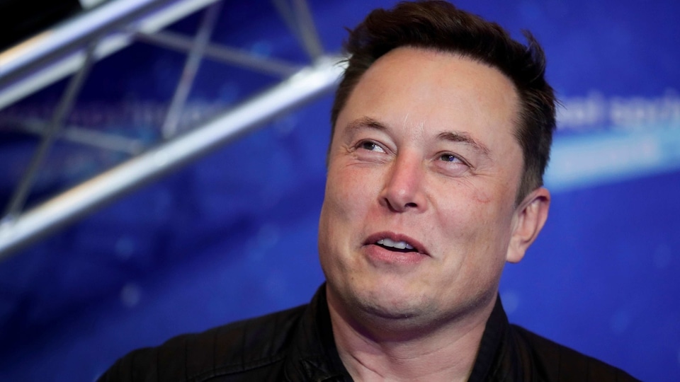 In a tweet Tuesday, Dec. 22, 2020, Musk said he once considered selling the electric car maker to Apple, but the iPhone maker’s CEO Tim Cook blew off the meeting. (Hannibal Hanschke/Pool Photo via AP, File)