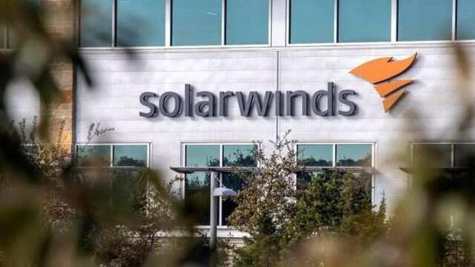 FILE PHOTO: The SolarWinds logo is seen outside its headquarters in Austin, Texas, U.S., December 18, 2020. REUTERS/Sergio Flores/File Photo