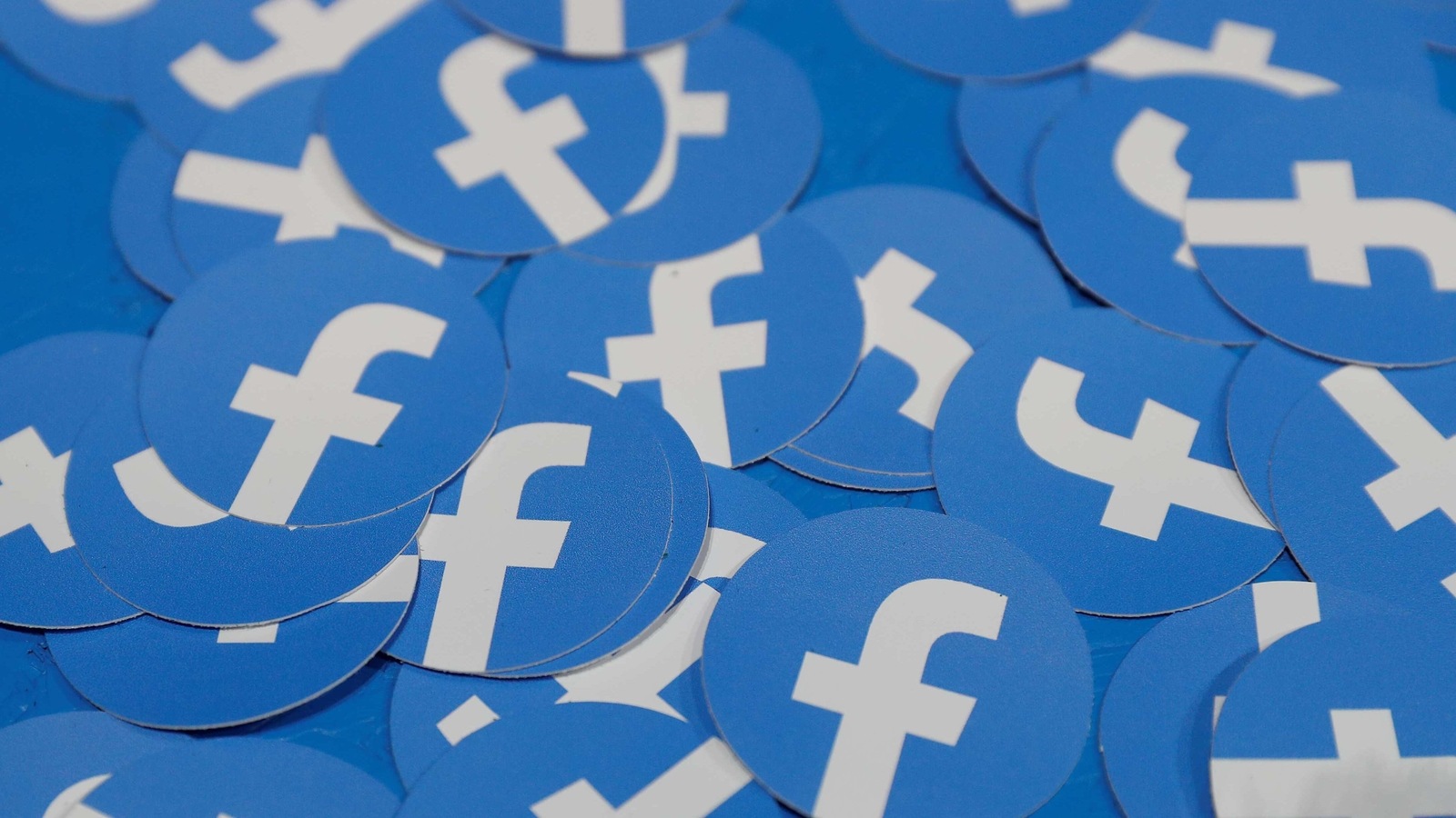 FILE PHOTO: Stickers bearing the Facebook logo are pictured at Facebook Inc's F8 developers conference in San Jose, California, U.S., April 30, 2019.  REUTERS/Stephen Lam/File Photo