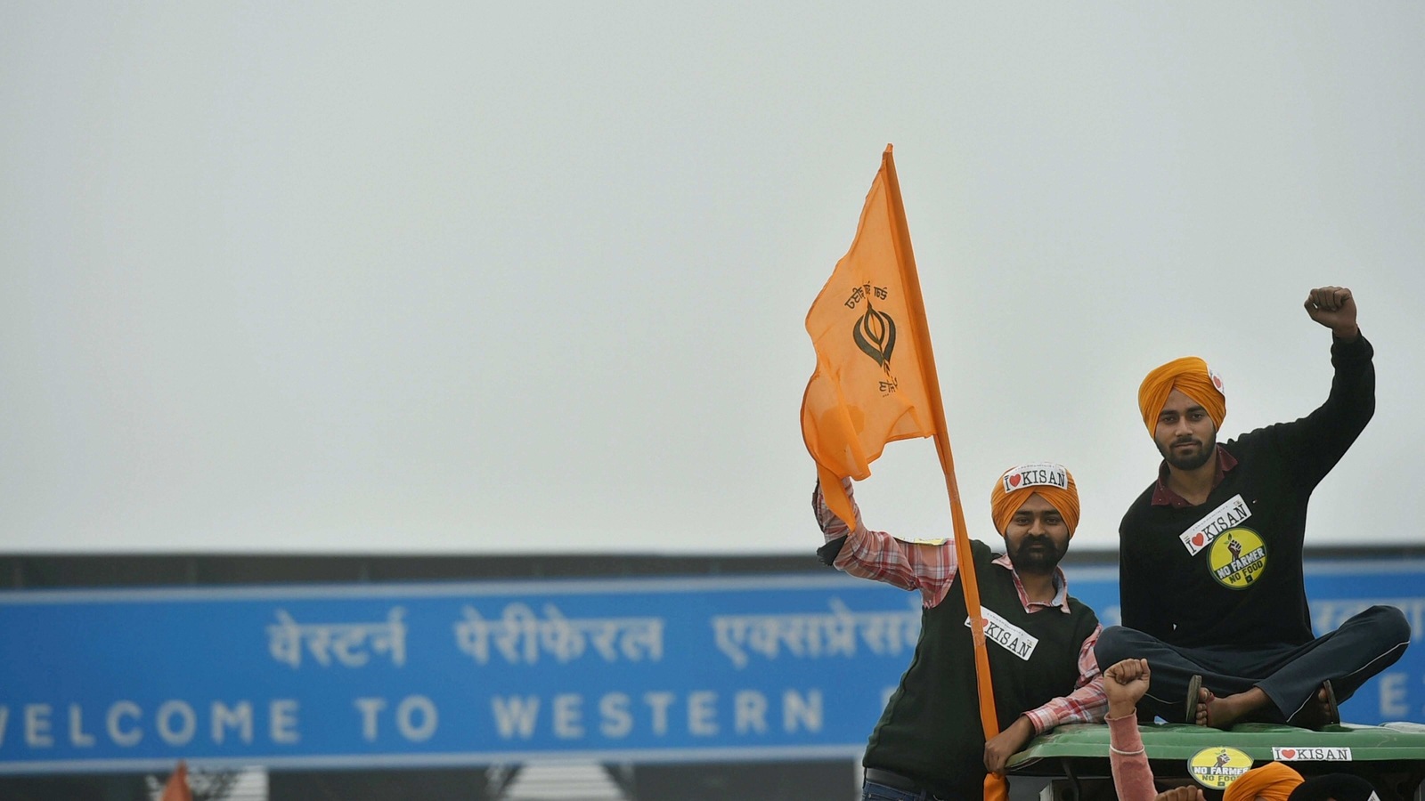 Farmers on their way to Tikri border during a tractor rally as part of their ongoing protest against the new farm laws, at Western Peripheral Expressway in Kundli, Sonipat, Thursday, Jan. 07, 2021.