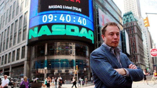FILE PHOTO: FILE PHOTO: CEO of Tesla Motors Elon Musk poses during a television interview after his company's initial public offering at the NASDAQ market in New York, June 29, 2010. REUTERS/Brendan McDermid/File Photo/File Photo