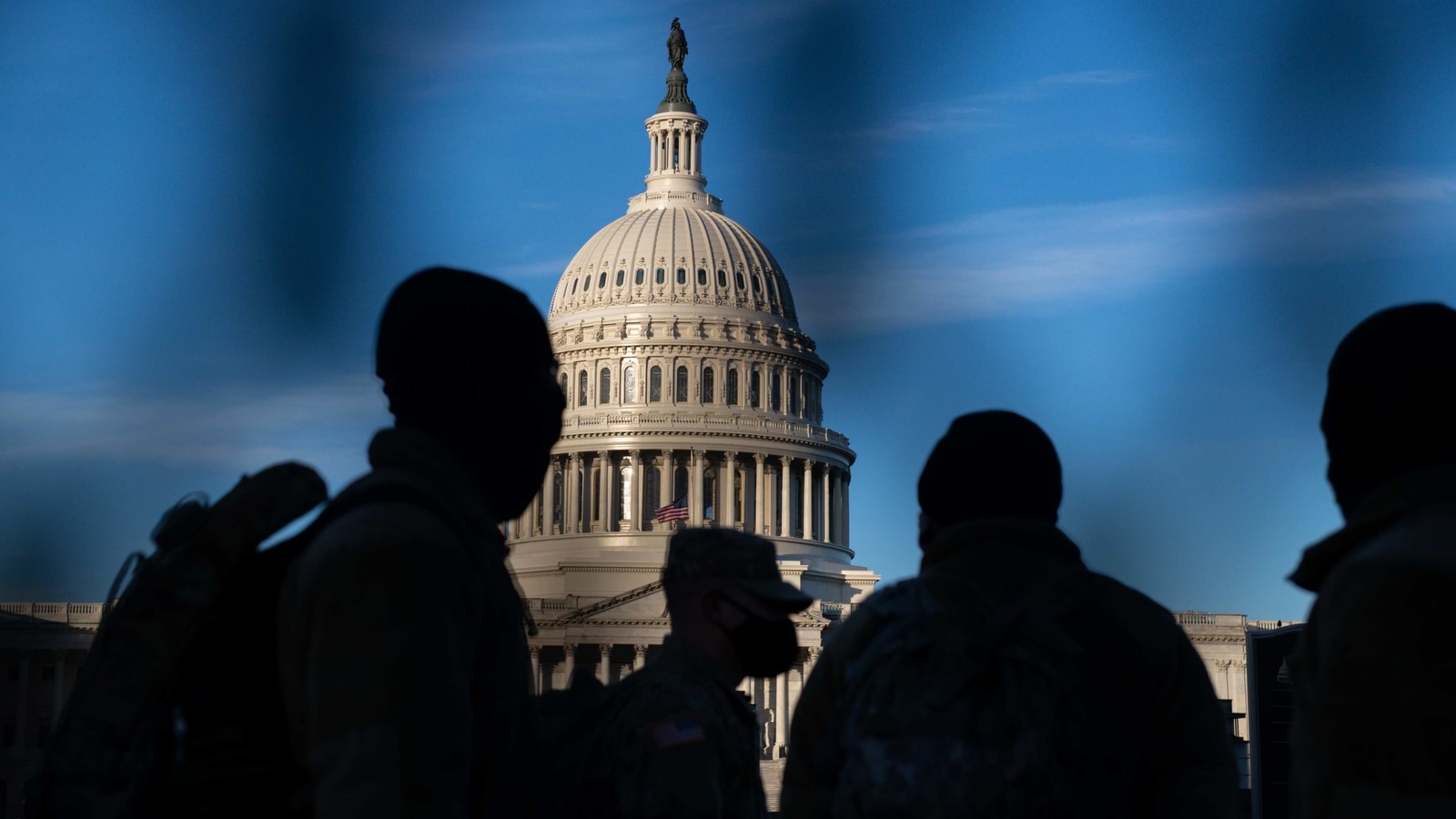 Members of the National Guard stand guard near the U.S. Capitol in Washington, D.C., U.S..