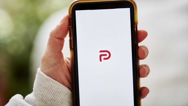 The Parler logo on a smartphone arranged in the Brooklyn borough of New York, U.S., on Friday, Dec. 18, 2020. Parler bills itself as a non-biased social network that protects free speech and user data. John Matze, chief executive officer, says the platform saw great growth during the 2020 election as many conservatives moved away from products like Facebook and Twitter.  Photographer: Gabby Jones/Bloomberg
