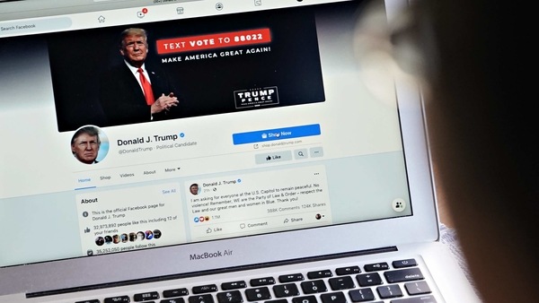 The Facebook account for U.S. President Donald Trump on a laptop computer arranged in Arlington, Virginia, U.S., on Thursday, Jan. 7, 2021. Facebook Inc. Chief Executive OfficerMark Zuckerbergsaid that the current block on Trump's Facebook and Instagram accounts will be extended indefinitely and for at least the next two weeks. Photographer: Andrew Harrer/Bloomberg