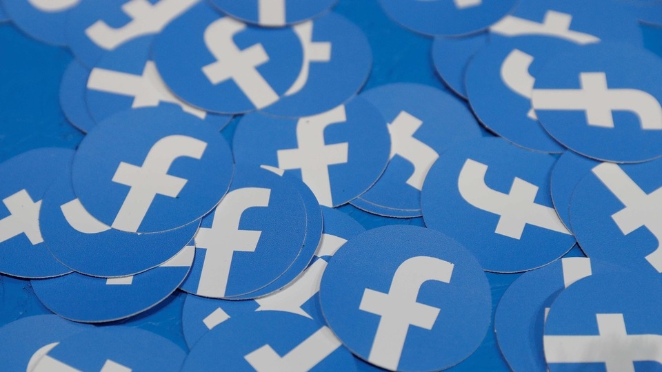 FILE PHOTO: Stickers bearing the Facebook logo are pictured at Facebook Inc's F8 developers conference in San Jose, California, U.S., April 30, 2019.  REUTERS/Stephen Lam/File Photo