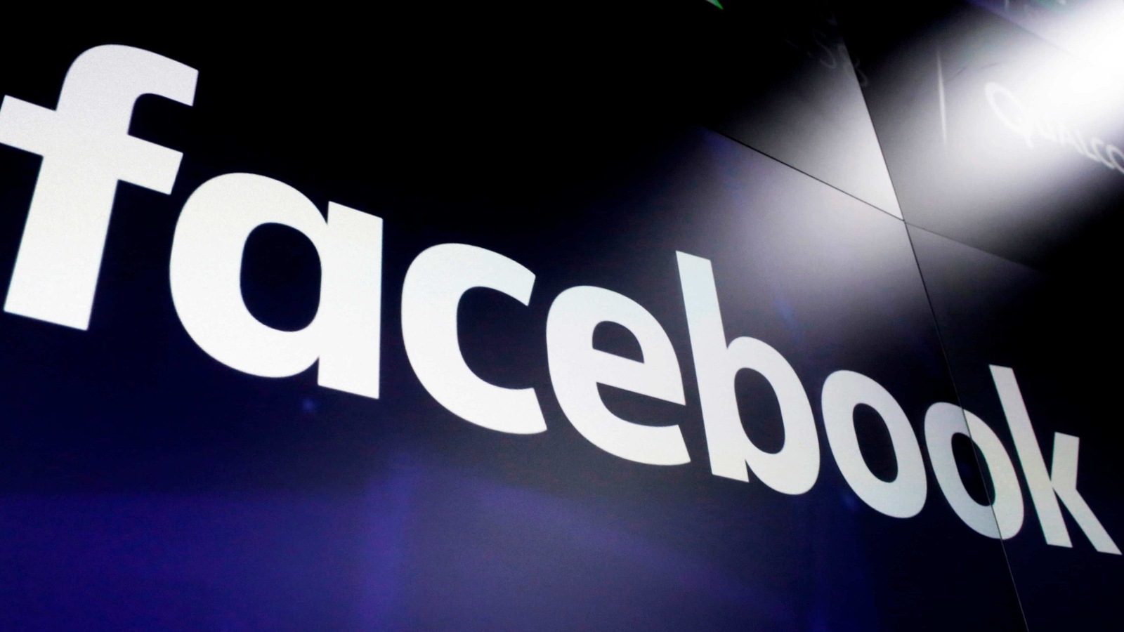 FILE - This March 29, 2018 file photo shows the Facebook logo on screens at the Nasdaq MarketSite, in New York's Times Square. Any EU country's privacy watchdog can take legal action against companies like Facebook over cross-border violations of the bloc's strict privacy rules, an adviser to the European Union's top court said Wednesday Jan. 13, 2021. (AP Photo/Richard Drew, File) FILE - This March 29, 2018 file photo shows the Facebook logo on screens at the Nasdaq MarketSite, in New York's Times Square. Any EU country's privacy watchdog can take legal action against companies like Facebook over cross-border violations of the bloc's strict privacy rules, an adviser to the European Union's top court said Wednesday Jan. 13, 2021. (AP Photo/Richard Drew, File)