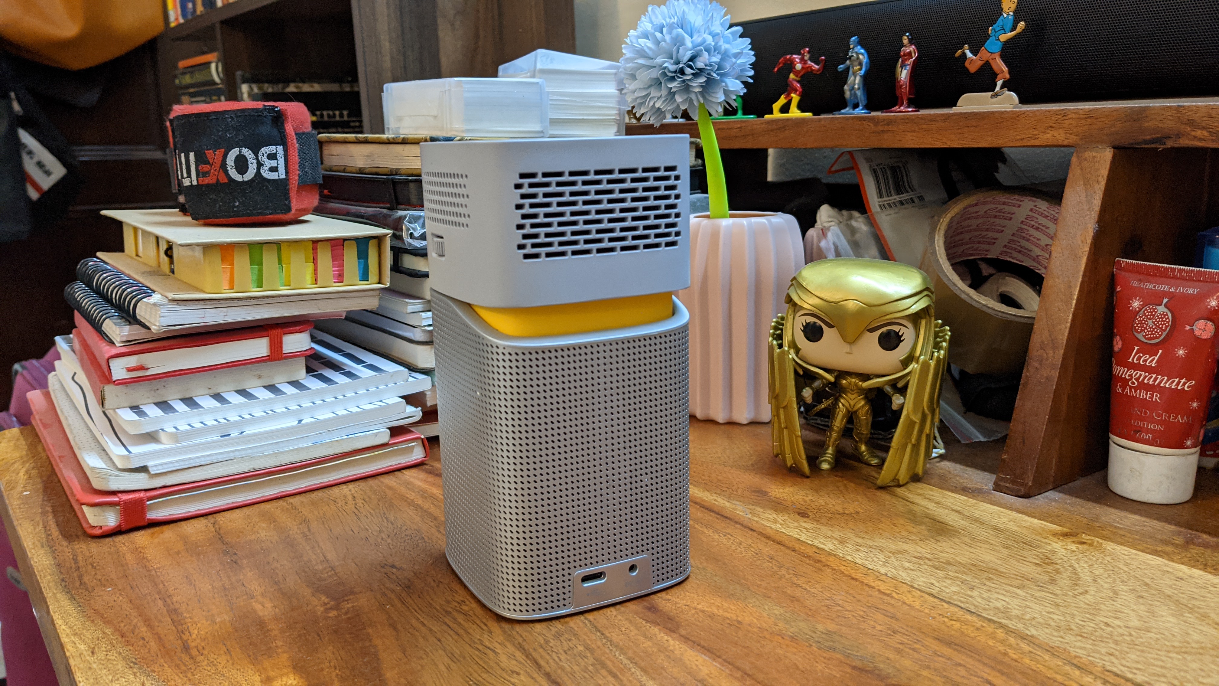 The top part of the BenQ GV1 is the projector, while the bottom part if the speaker. The top bit can also be tilted by 15 degrees to adjust image size. Don't miss those swanky yellow highlights! The top part of the BenQ GV1 is the projector, while the bottom part if the speaker. The top bit can also be tilted by 15 degrees to adjust image size. Don't miss those swanky yellow highlights!