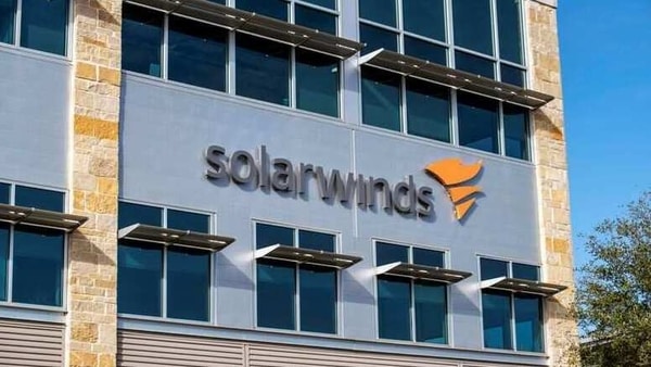 FILE PHOTO: The SolarWinds logo is seen outside its headquarters in Austin, Texas, U.S., December 18, 2020. REUTERS/Sergio Flores/File Photo