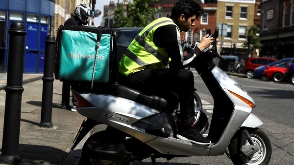 Deliveroo said it will continue to invest further in its business, including expanding its on-demand grocery service and “Editions” dark-kitchen concept.