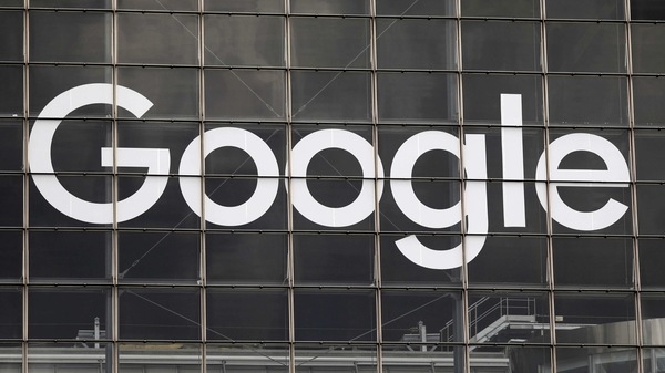 FILE PHOTO: The logo of Google is seen on a building at la Defense business and financial district in Courbevoie near Paris, France, September 1, 2020.  REUTERS/Charles Platiau/File Photo