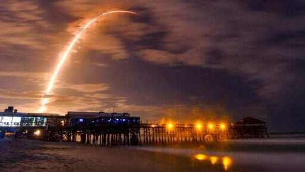 In this time exposure taken from Westgate Cocoa Beach Pier in Cocoa Beach, Fla., a SpaceX Falcon 9 rocket lifts off from Pad 40 at Cape Canaveral Air Force Station, Fla., Tuesday, Nov. 24, 2020. The rocket is carrying the 16th batch of Starlink communications satellites. (Malcolm Denemark/Florida Today via AP)