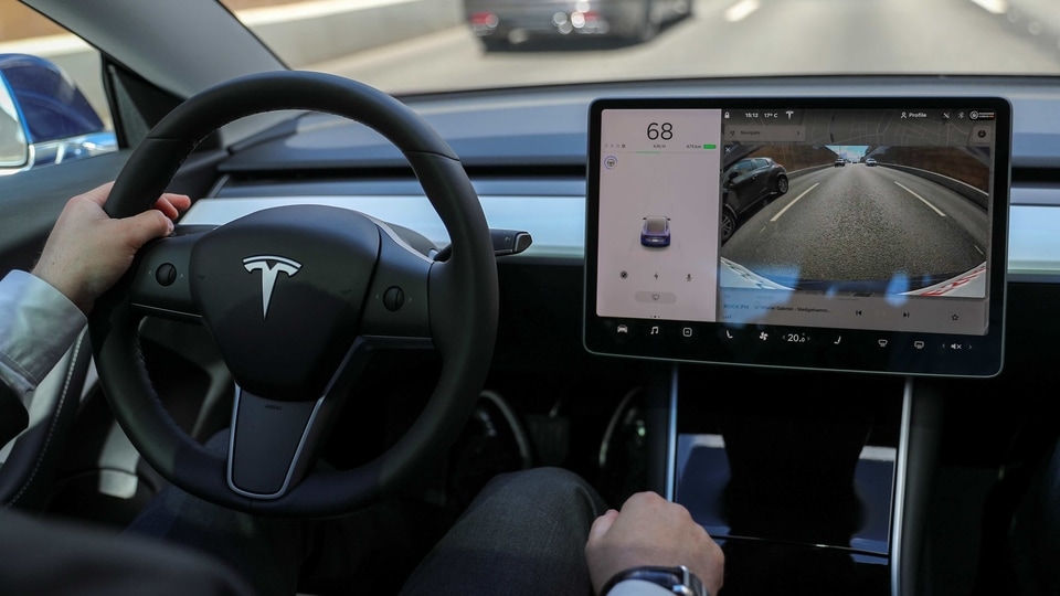 The interior of a Tesla Model 3 electric vehicle is shown in this picture illustration taken in Moscow, 