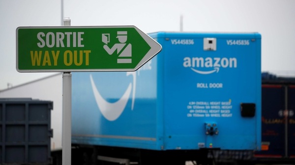 Amazon trailer trucks are seen at Cherbourg Harbour, France January 21, 2021.  Brexit delays and customs checks have led to a surge in demand to ship goods in and out of Ireland direct to European ports like Cherbourg in France. Picture taken on January 21, 2021. REUTERS/Gonzalo Fuentes