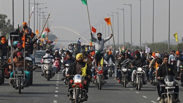 Farmers protest during a tractor rally at the Inner Ring Road in New Delhi, India, on Tuesday, Jan. 26, 2021. Thousands of Indian farmers on tractors entered New Delhi as the country marked its Republic Day, escalating protests against new agricultural laws passed by Prime Minister�Narendra Modi's government. Photographer: Anindito Mukherjee/Bloomberg