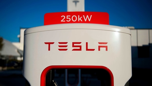 A Tesla logo is seen on a 250kW electric vehicle charging station at the Tesla Inc. supercharger station on January 4, 2021 in Hawthorne, California.