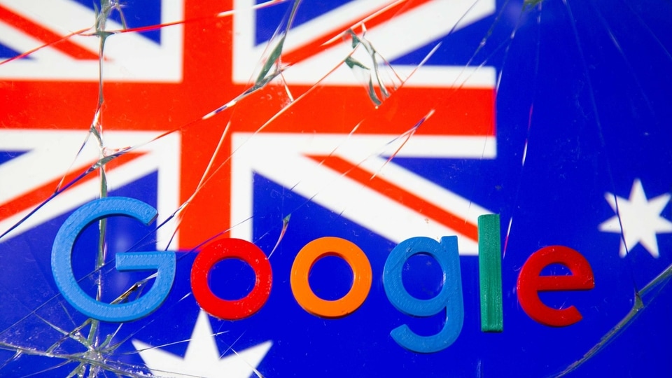 A 3D printed Google logo is placed on broken glass in front of displayed Australian flag  in this illustration taken, January 22, 2021. REUTERS/Dado Ruvic/Illustration