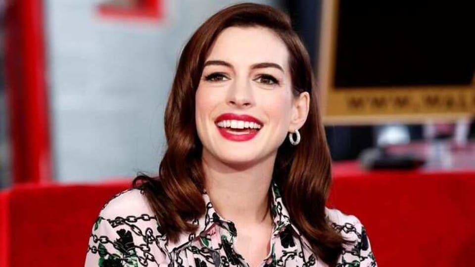 Anne Hathaway poses as she is honored with a star on the Hollywood Walk of Fame in Los Angeles, California, U.S., May 9, 2019. REUTERS/Mario Anzuoni/File Photo