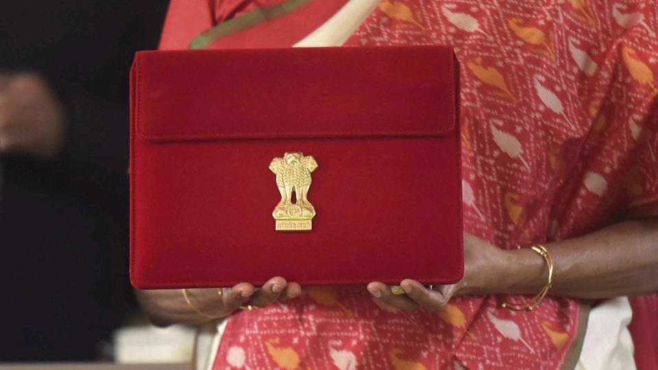 Finance Minister Nirmala Sitharaman holds a case containing a tablet device, during the Budget Session of the Parliament, at Parliament House in New Delhi,