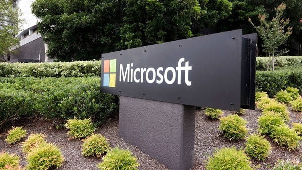 The Microsoft company logo is displayed at their offices in Sydney, Wednesday, Feb. 3, 2021. Microsoft says it supports Australia's plans to make the biggest digital platforms pay for news and would help small businesses transfer their advertising to Bing if Google quits the country. (AP Photo/Rick Rycroft)