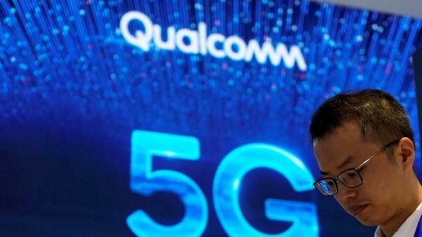 FILE PHOTO: Signs of Qualcomm and 5G are pictured at Mobile World Congress (MWC) in Shanghai, China June 28, 2019. REUTERS/Aly Song/File Photo