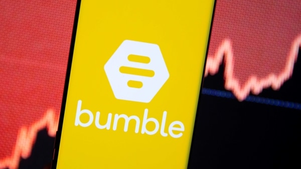 The Bumble logo is seen on a smartphone in front of a stock graph in this illustration taken February 11, 2021. REUTERS/Dado Ruvic/Illustration REFILE - CORRECTING BRAND NAME