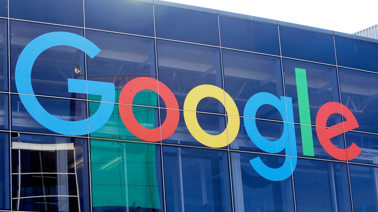 FILE - In this Sept. 24, 2019, file photo a sign is shown on a Google building at their campus in Mountain View, Calif. Australia’s Parliament will debate making Google and Facebook pay for news after a Senate committee on Friday, Feb. 12, 2021 recommended no changes to the world-first draft laws. (AP Photo/Jeff Chiu, File)