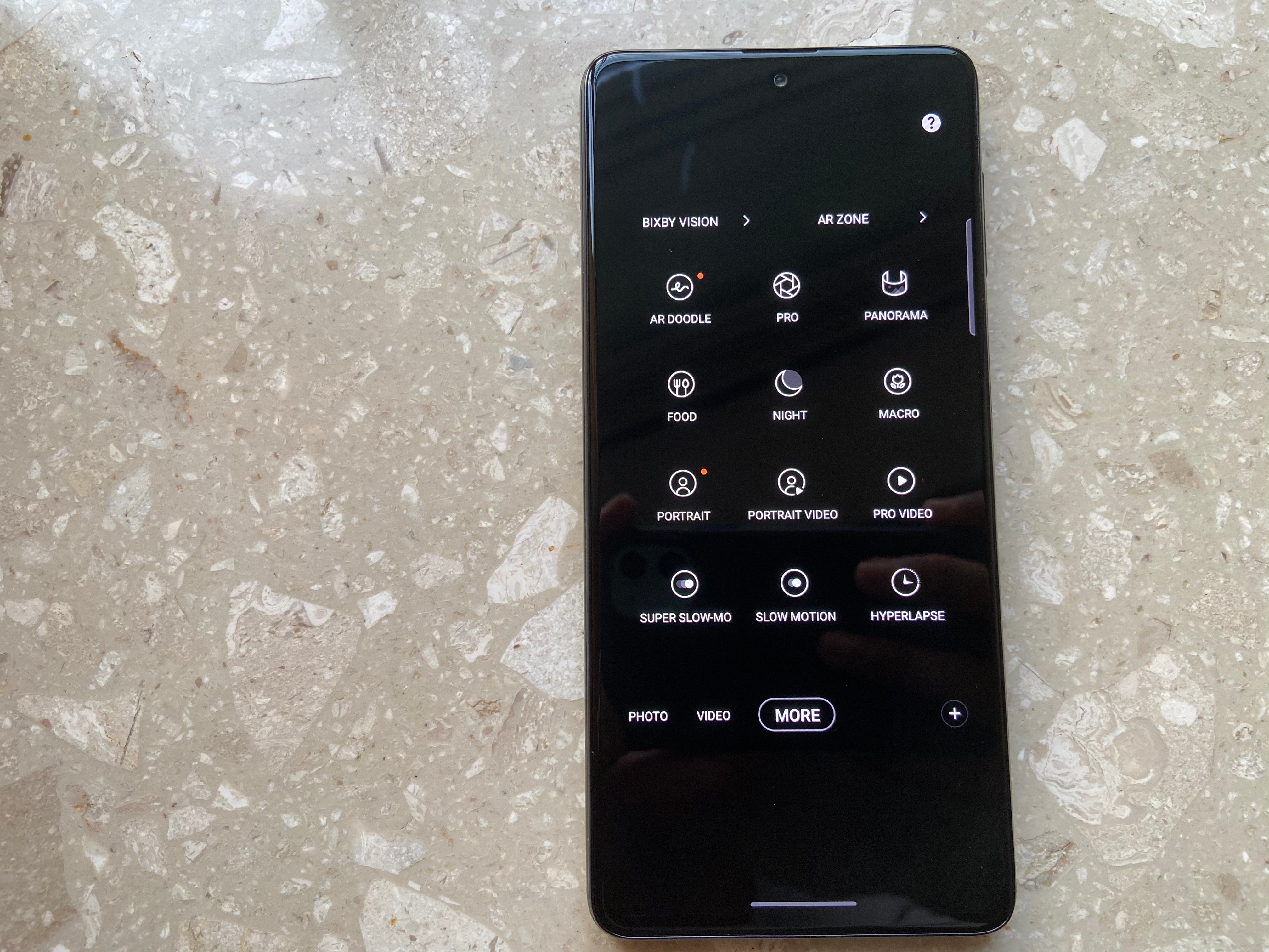 Samsung’s camera interface has also packed in all the camera modes from its flagship phones - except Director Mode from the Galaxy S21 series. Samsung’s camera interface has also packed in all the camera modes from its flagship phones - except Director Mode from the Galaxy S21 series.