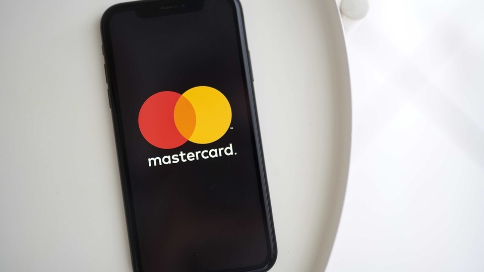 The MasterCard Inc. logo on a smartphone.