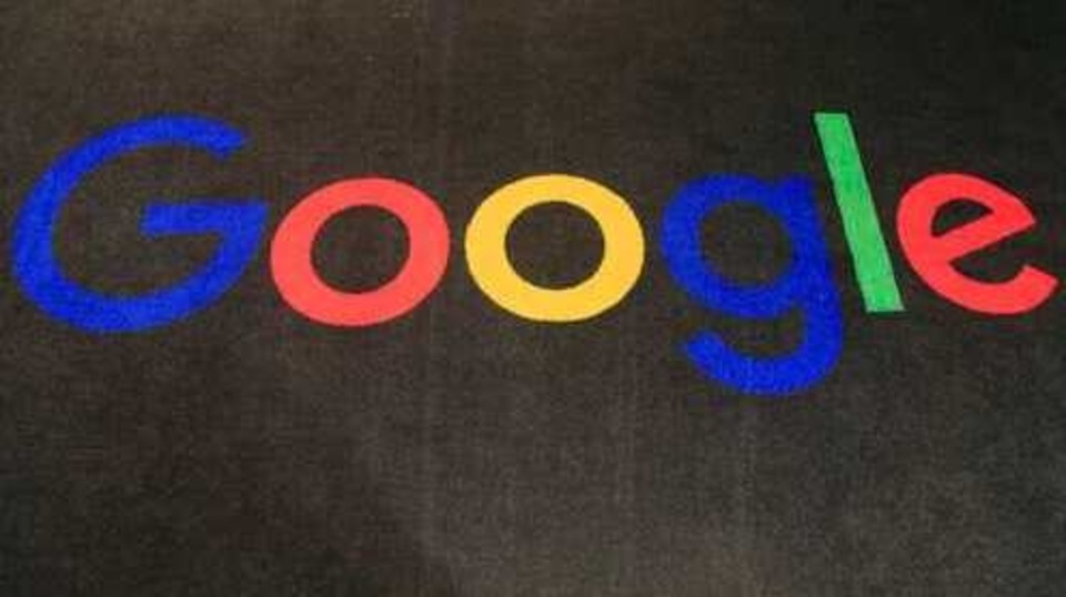 FILE - In this Monday, Nov. 18, 2019, file photo, the logo of Google is displayed on a carpet at the entrance hall of Google France in Paris. Google has agreed to pay a fine 1.1 million euros ($1.3 million) after French authorities concluded the search engine was featuring 