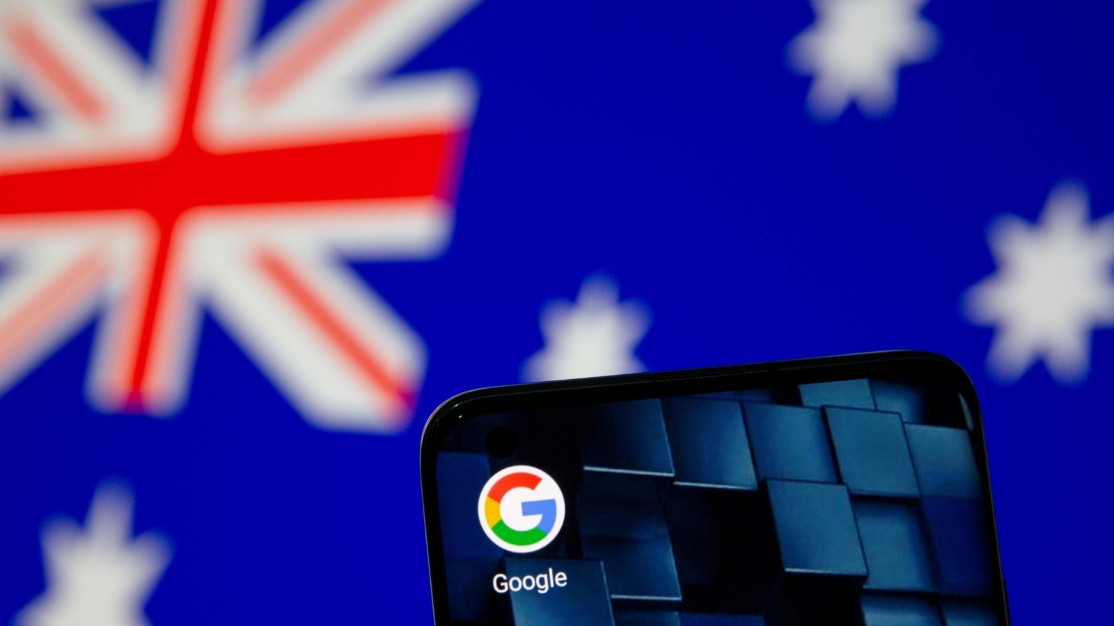 Smartphone with Google app icon is seen in front of the Australian flag in this illustration taken January 22, 2021. REUTERS/Dado Ruvic/Illustration/File Photo