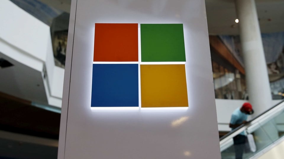 FILE PHOTO: A Microsoft logo is seen at a pop-up site for the new Windows 10 operating system at Roosevelt Field in Garden City, New York July 29, 2015. REUTERS/Shannon Stapleton/File Photo