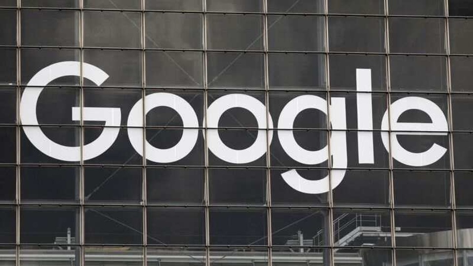FILE PHOTO: The logo of Google is seen on a building at la Defense business and financial district in Courbevoie near Paris, France, September 1, 2020.  REUTERS/Charles Platiau