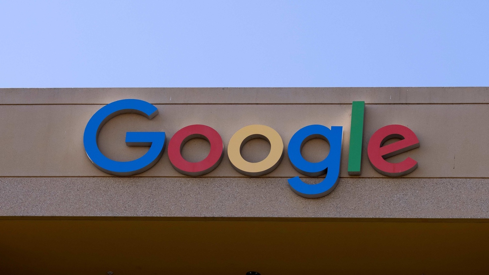 FILE PHOTO: The Google sign is shown on one of the company's office buildings in Irvine, California, U.S., October 20, 2020.   REUTERS/Mike Blake/File Photo