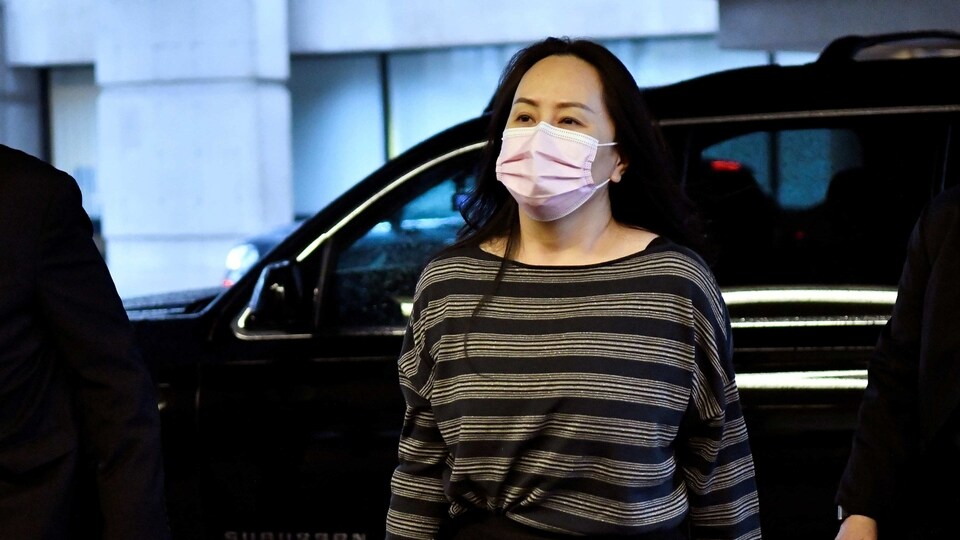 FILE PHOTO: Huawei Technologies Chief Financial Officer Meng Wanzhou arrives at court following a lunch break in Vancouver, British Columbia, Canada December 7, 2020. REUTERS/Jennifer Gauthier/File Photo