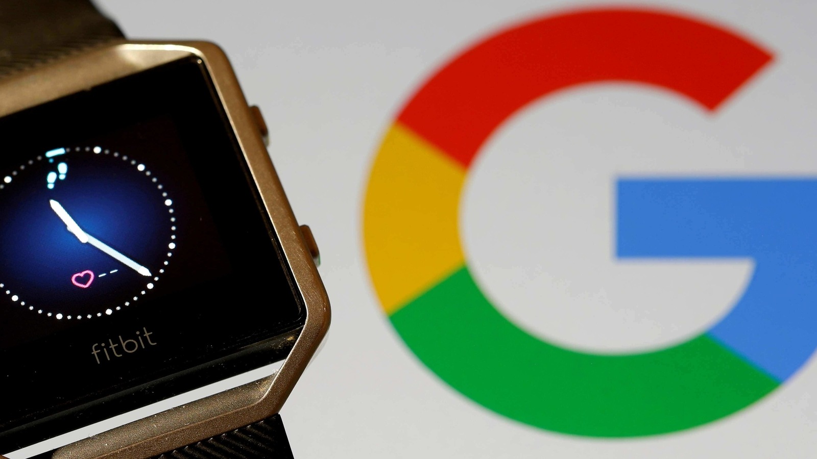 FILE PHOTO: Fitbit Blaze watch is seen in front of a displayed Google logo in this illustration picture taken, November 8, 2019. REUTERS/Dado Ruvic/File Photo/File Photo