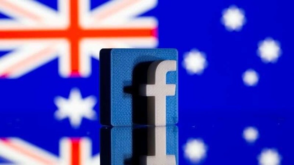 FILE PHOTO: A 3D-printed Facebook logo is seen in front of a displayed Australian flag in this illustration photo taken February 18, 2021. REUTERS/Dado Ruvic/Illustration/File Photo