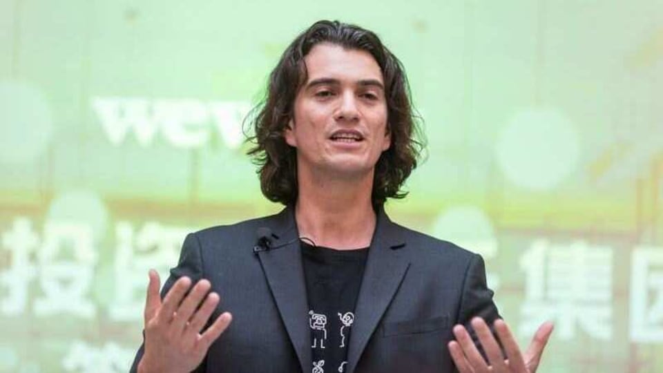 FILE PHOTO: Adam Neumann, chief executive officer of U.S. co-working firm WeWork, speaks during a signing ceremony in Shanghai, China April 12, 2018.  Jackal Pan via REUTERS