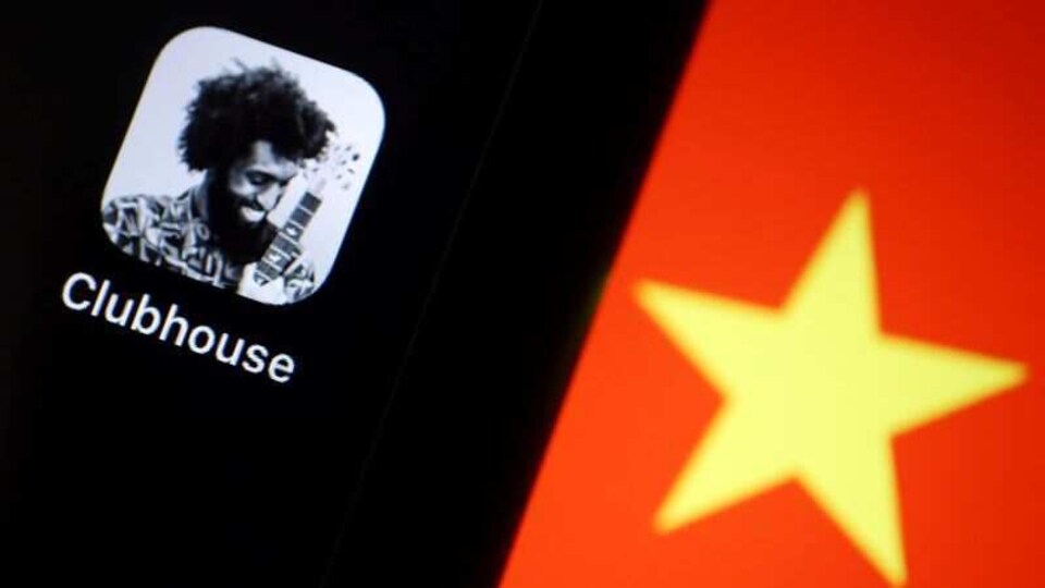 FILE PHOTO: The social audio app Clubhouse is pictured near a star on the Chinese flag in this illustration picture taken February 8, 2021. REUTERS/Florence Lo/Illustration/File Photo