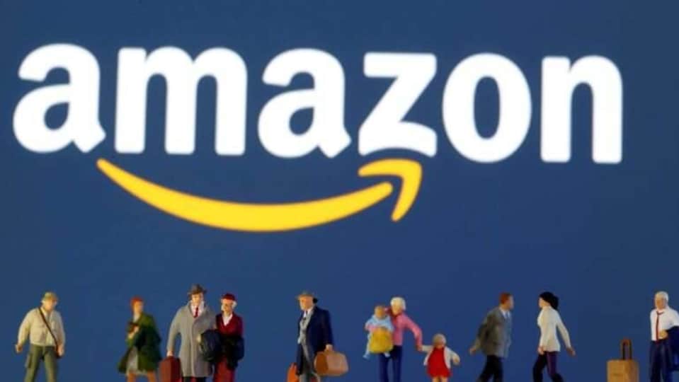 FILE PHOTO: Small toy figures are seen in front of diplayed Amazon  logo in this illustration taken March 19, 2020. REUTERS/Dado Ruvic/File Photo