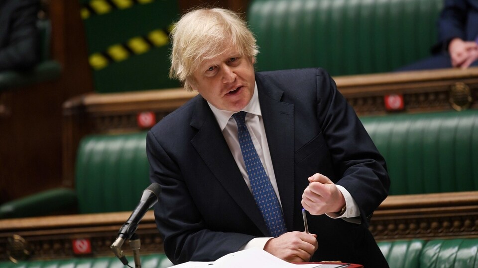 FILE PHOTO: British Prime Minister Boris Johnson speaks during the weekly question time debate at the House of Commons in London.
